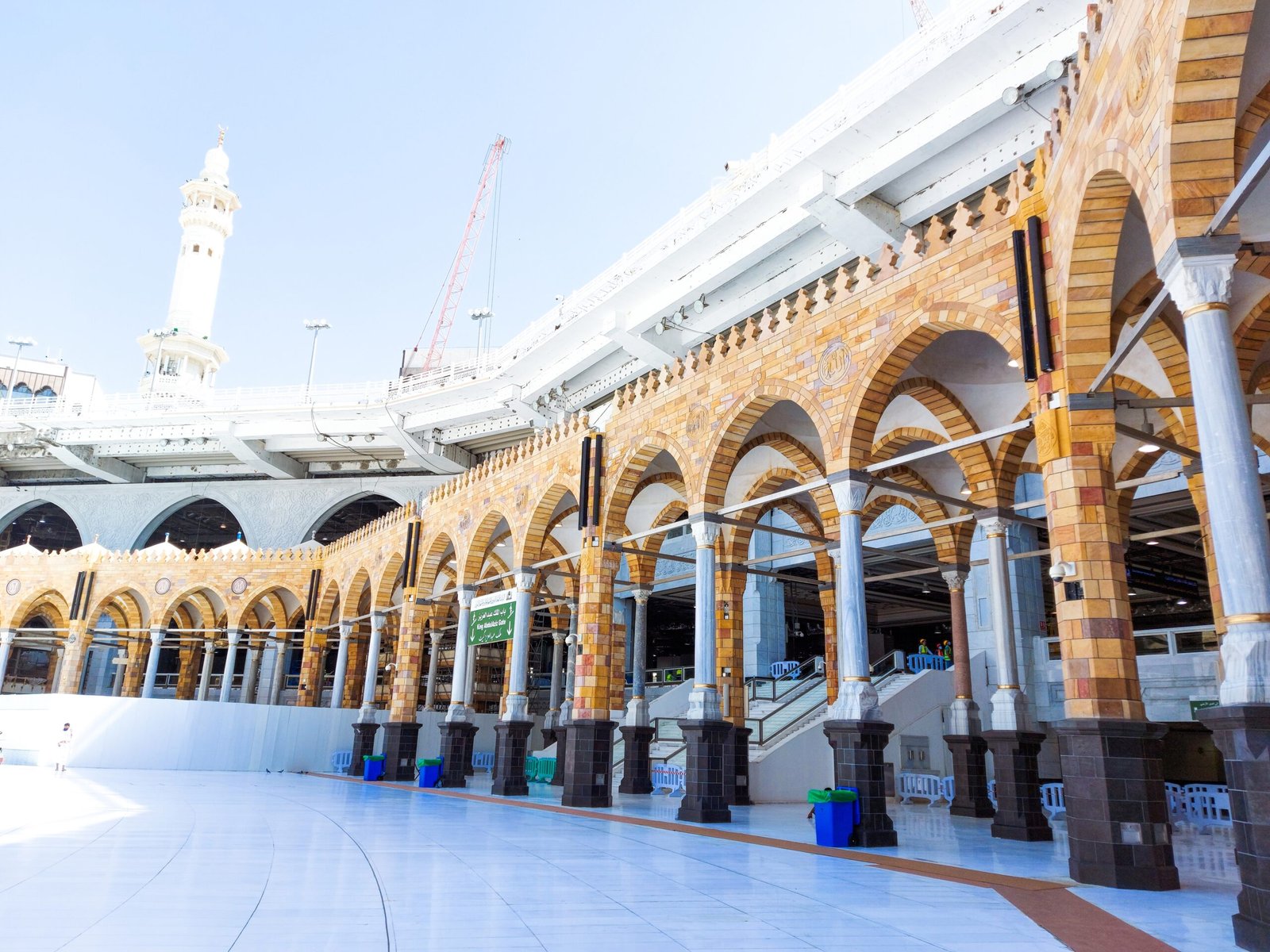 MECCA , SAUDI ARABIA , OCT/22/2020 - Pilgrims circle the Kaaba at Masjid al-Haram - umrah Fewer Muslims people Socially Distanced corona virus wearing face mask Covid 19